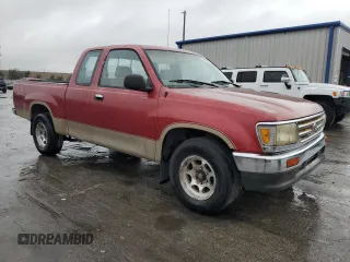 1995 Toyota T100 DX with VIN JT4VD12E2S0002571, listed as a Copart auction lot 89274925 with 257,083 mi miles and Salvage Title. Bid and sale history available at DreamBid. Image 4.