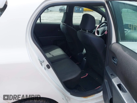 2009 Toyota Yaris with VIN JTDKT903095258534, listed as a IAAI auction lot 41947150 with 171,631 mi miles and . Bid and sale history available at DreamBid. Image 8.