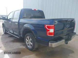 2019 Ford F-150 XL with VIN 1FTEW1C59KKC97620, listed as a IAAI auction lot 42395888 with 71,737 mi miles and . Bid and sale history available at DreamBid. Image 3.
