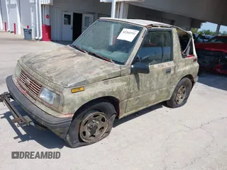 1995 Chevrolet Tracker z VIN 2CNBJ1869S6911342, wystawiony jako IAAI lot #42265392 z przebiegiem 121 944 mil mil oraz . Historia ofert i sprzedaży dostępna na DreamBid. Obrazek 2.