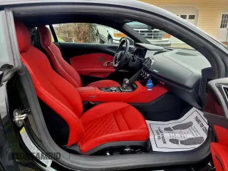 2021 Audi R8 z VIN WUAKBAFX4M7901384, wystawiony jako Copart lot #81273994 z przebiegiem 5665 mil mil oraz Tytuł czysty. Historia ofert i sprzedaży dostępna na DreamBid. Obrazek 5.