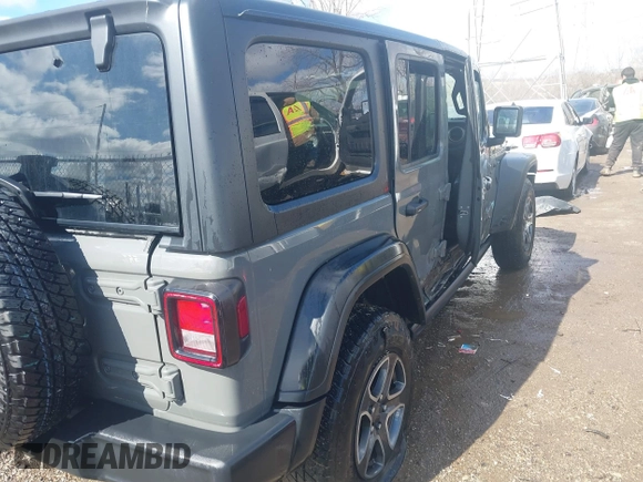 2020 Jeep Wrangler Unlimited Sport Altitude with VIN 1C4HJXDG2LW335228, listed as a IAAI auction lot 41711295 with 43,451 mi miles and . Bid and sale history available at DreamBid. Image 4.
