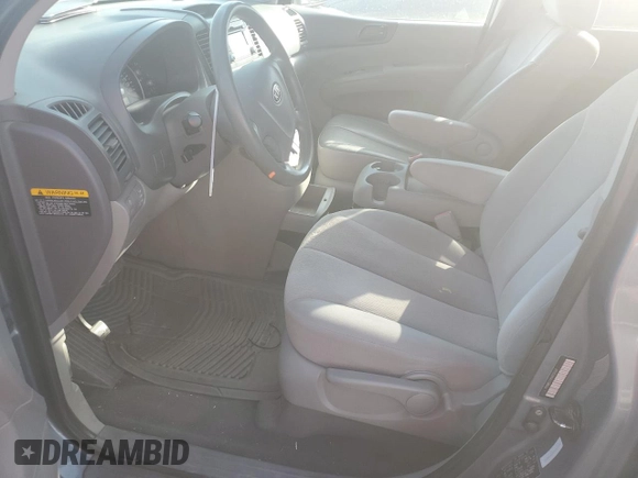 2009 Kia Sedona LX with VIN KNDMB233896315104, listed as a Copart auction lot 74995564 with 210,916 mi miles and Salvage Title. Bid and sale history available at carsss.com. Image 7.