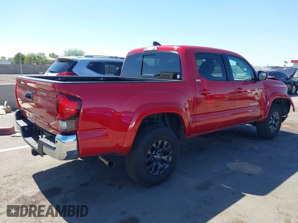 2022 Toyota Tacoma SR5 with VIN 3TMAZ5CN5NM194494, listed as a IAAI auction lot 42555021 with 20,915 mi miles and . Bid and sale history available at DreamBid. Image 4.