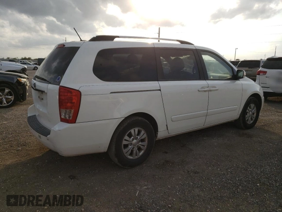 2012 Kia Sedona LX with VIN KNDMG4C79C6502438, listed as a Copart auction lot 77833384 with 169,459 mi miles and Clean Title. Bid and sale history available at carsss.com. Image 3.