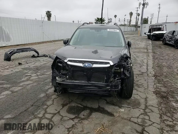2018 Subaru Forester Touring z VIN JF2SJAWC2JH459659, wystawiony jako Copart lot #49343805 z przebiegiem 42 513 mil mil oraz Szkoda całkowita • Salvage title. Historia ofert i sprzedaży dostępna na DreamBid. Obrazek 11.