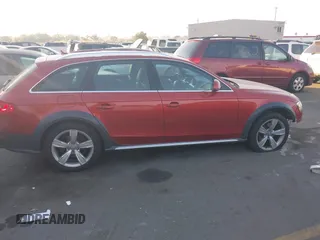 2014 Audi allroad Premium Plus with VIN WA1UFAFL1EA069928, listed as a IAAI auction lot 40558283 with 138,316 mi miles. Bid and sale history available at carsss.com. Image 13.