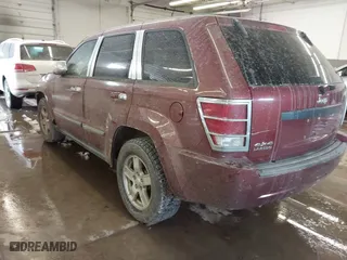 2007 Jeep Grand Cherokee Laredo with VIN 1J8GR48K17C583519, listed as a IAAI auction lot 41509027 with 132,992 mi miles. Bid and sale history available at carsss.com. Image 3.