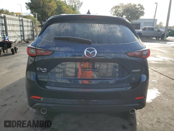 2024 Mazda CX-5 2.5 S Carbon Edition with VIN JM3KFBCL0R0458750, listed as a Copart auction lot 45976215 with 5,194 mi miles and Salvage Title. Bid and sale history available at carsss.com. Image 6.