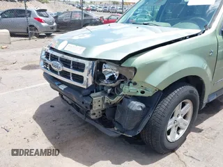 2008 Ford Escape Hybrid z VIN 1FMCU59HX8KB98122, wystawiony jako IAAI lot #42650207 z przebiegiem 138 757 mil mil oraz . Historia ofert i sprzedaży dostępna na DreamBid. Obrazek 6.