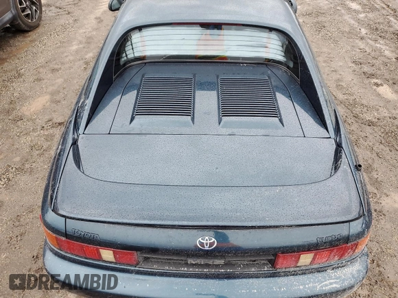 1992 Toyota MR2 z VIN JT2SW22N5N0058195, wystawiony jako Copart lot #74886194 z przebiegiem 158 816 mil mil oraz Nie do naprawy • Non repairable. Historia ofert i sprzedaży dostępna na DreamBid. Obrazek 11.