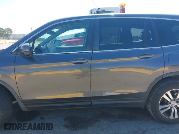2017 Honda Pilot EX-L with VIN 5FNYF6H59HB032480, listed as a IAAI auction lot 42488789 with 112,595 mi miles and . Bid and sale history available at DreamBid. Image 14.