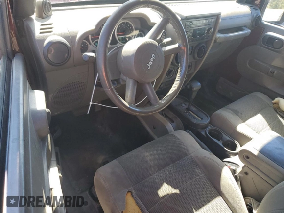 2007 Jeep Wrangler Sahara z VIN 1J8FA54187L131573, wystawiony jako Copart lot #44863875 z przebiegiem 205 221 mil mil oraz Szkoda całkowita • Salvage title. Historia ofert i sprzedaży dostępna na DreamBid. Obrazek 8.