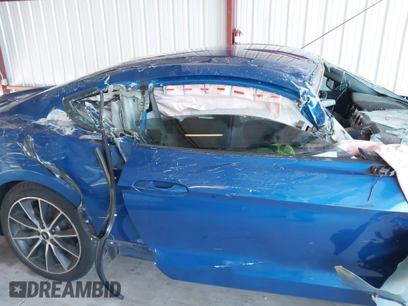 2017 Ford Mustang EcoBoost z VIN 1FA6P8TH1H5239681, wystawiony jako IAAI lot #39953332 z przebiegiem 102 035 mil mil oraz . Historia ofert i sprzedaży dostępna na DreamBid. Obrazek 17.