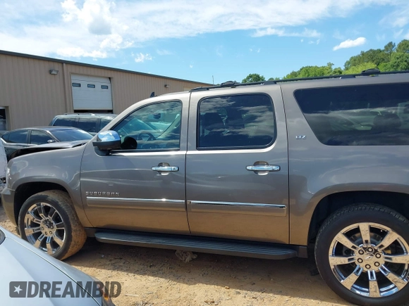 2011 Chevrolet Suburban LTZ with VIN 1GNSKKE3XBR394436, listed as a IAAI auction lot 42324225 with 132,871 mi miles and . Bid and sale history available at DreamBid. Image 14.