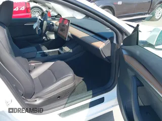 2023 Tesla Model 3 with VIN 5YJ3E1EA9PF585632, listed as a IAAI auction lot 40520993 with 7,775 mi miles and . Bid and sale history available at DreamBid. Image 5.