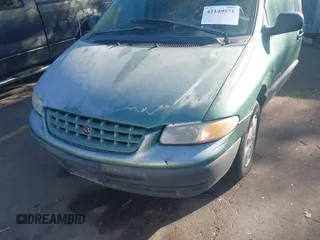 1999 Plymouth Voyager Grand SE z VIN 2P4GP44G1XR180660, wystawiony jako IAAI lot #42149571 z przebiegiem Nie podano mil oraz . Historia ofert i sprzedaży dostępna na DreamBid. Obrazek 6.