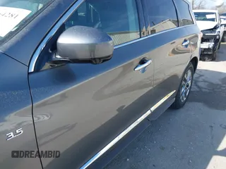 2015 Infiniti QX60 with VIN 5N1AL0MM4FC536249, listed as a IAAI auction lot 41964281 with 148,851 mi miles and . Bid and sale history available at DreamBid. Image 12.
