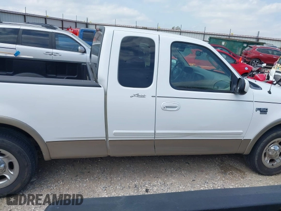 2003 Ford F-150 XL with VIN 1FTRX17L33NB79733, listed as a IAAI auction lot 42023385 with 136,236 mi miles. Bid and sale history available at carsss.com. Image 13.