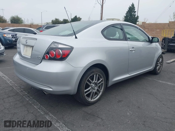 2010 Scion tC with VIN JTKDE3B70A0319343, listed as a IAAI auction lot 41985804 with 133,595 mi miles. Bid and sale history available at carsss.com. Image 4.