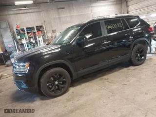 2019 Volkswagen Atlas 3.6L V6 SE with VIN 1V2LR2CAXKC599542, listed as a IAAI auction lot 41628588 with 59,377 mi miles. Bid and sale history available at carsss.com. Image 2.