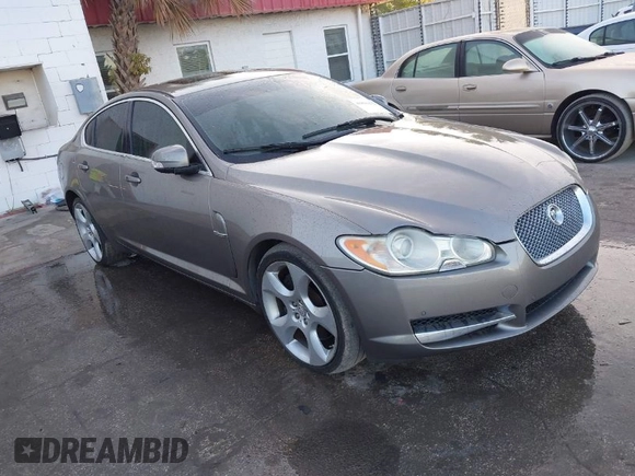 2009 Jaguar XF with VIN SAJWA07C991R01450, listed as a IAAI auction lot 41896882 with 163,857 mi miles and . Bid and sale history available at DreamBid. Image 1.