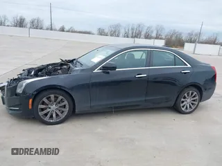 2017 Cadillac ATS AWD z VIN 1G6AG5RX6H0126052, wystawiony jako IAAI lot #41327350 z przebiegiem Nie podano mil oraz . Historia ofert i sprzedaży dostępna na DreamBid. Obrazek 13.
