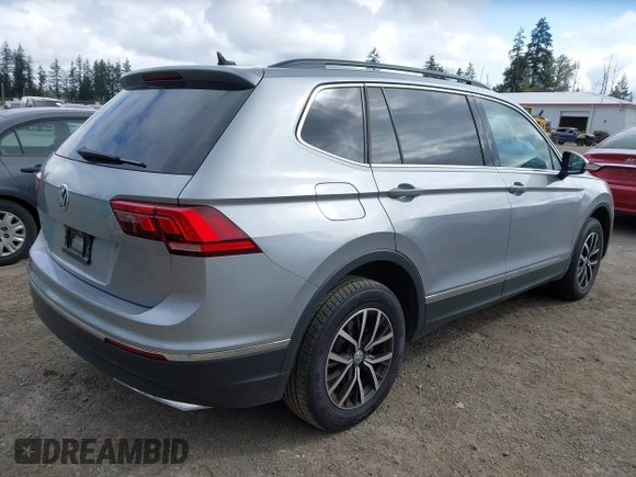 2021 Volkswagen Tiguan SE with VIN 3VV3B7AX0MM008809, listed as a IAAI auction lot 42077986 with 70,780 mi miles and . Bid and sale history available at DreamBid. Image 4.
