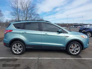 2013 Ford Escape SE with VIN 1FMCU9G96DUD33369, listed as a IAAI auction lot 41613303 with 132,657 mi miles. Bid and sale history available at carsss.com. Image 13.