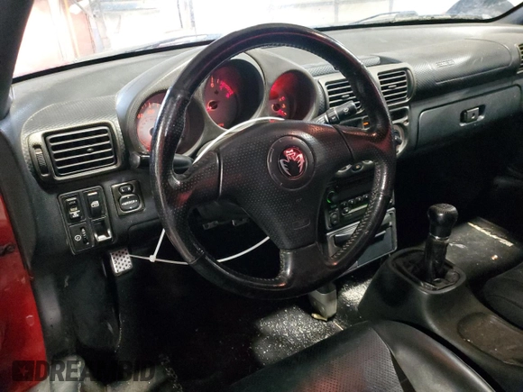 2002 Toyota MR2 z VIN JTDFR320320041854, wystawiony jako Copart lot #82822754 z przebiegiem 129 450 mil mil oraz Szkoda całkowita • Salvage title. Historia ofert i sprzedaży dostępna na DreamBid. Obrazek 8.