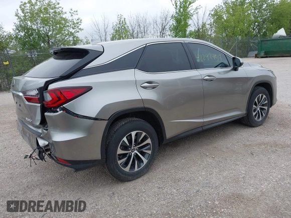 2022 Lexus RX 350 with VIN 2T2AZMDA7NC352957, listed as a IAAI auction lot 42297457 with 34,576 mi miles and . Bid and sale history available at DreamBid. Image 4.
