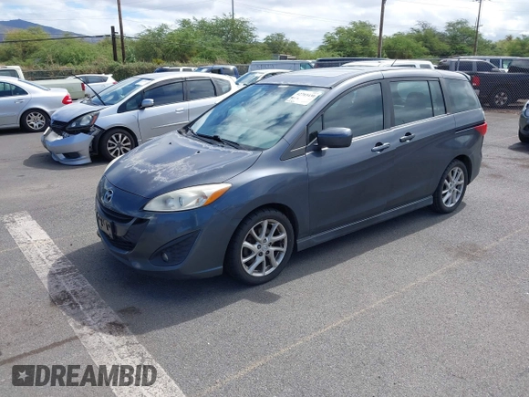 2012 Mazda 5 Grand Touring with VIN JM1CW2DL0C0139982, listed as a IAAI auction lot 42703430 with 129,763 mi miles and . Bid and sale history available at DreamBid. Image 2.