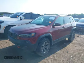 2019 Jeep Cherokee Trailhawk with VIN 1C4PJMBX5KD421043, listed as a IAAI auction lot 42570336 with 114,463 mi miles and . Bid and sale history available at DreamBid. Image 2.