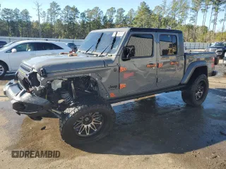 2022 Jeep Gladiator Willys with VIN 1C6HJTAG7NL117102, listed as a Copart auction lot 87679075 with 28,196 mi miles and Salvage Title. Bid and sale history available at carsss.com. Image 1.