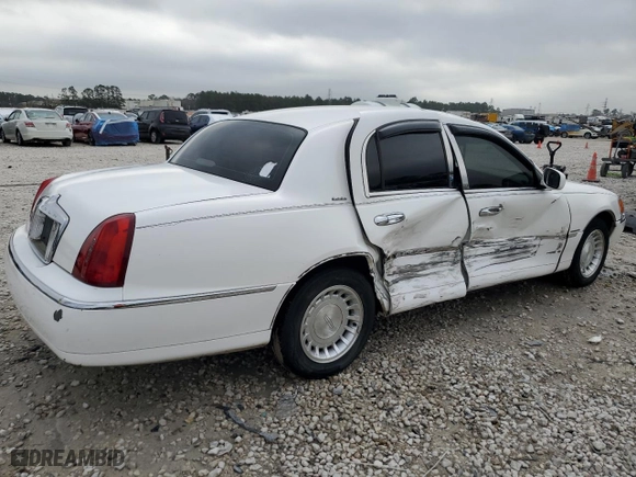 2001 Lincoln Town Car Executive with VIN 1LNHM81W91Y650775, listed as a Copart auction lot 47074385 with 141,344 mi miles and Salvage Title. Bid and sale history available at carsss.com. Image 3.