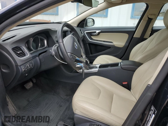 2016 Volvo S60 T5 Drive-E Premier z VIN YV126MFK5G2412365, wystawiony jako Copart lot #51577155 z przebiegiem 59 319 mil mil oraz Szkoda całkowita • Salvage title. Historia ofert i sprzedaży dostępna na DreamBid. Obrazek 7.