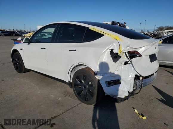 2025 Tesla Model Y Long Range with VIN 7SAYGDEDXSF228371, listed as a Copart auction lot 43925575 with 2,848 mi miles and Salvage Title. Bid and sale history available at DreamBid. Image 2.