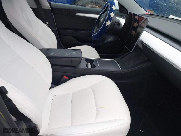 2021 Tesla Model 3 Performance with VIN 5YJ3E1EC3MF995632, listed as a IAAI auction lot 41548478 with 43,585 mi miles. Bid and sale history available at carsss.com. Image 5.