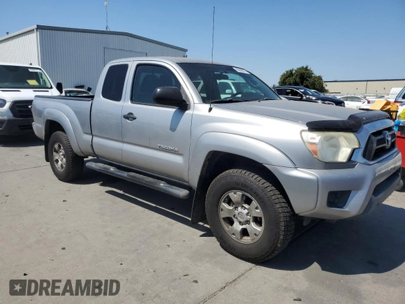 2014 Toyota Tacoma PreRunner with VIN 5TFTX4GN6EX028255, listed as a Copart auction lot 62890915 with 306,908 mi miles and Salvage title. Bid and sale history available at DreamBid. Image 4.