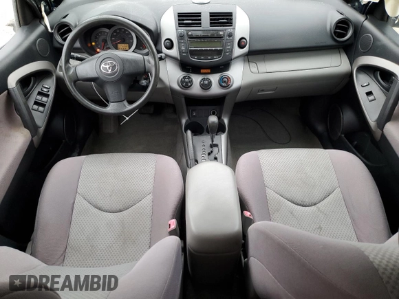 2007 Toyota RAV4 with VIN JTMZK33V975011019, listed as a Copart auction lot 82492564 with 155,097 mi miles and Salvage Title. Bid and sale history available at DreamBid. Image 8.