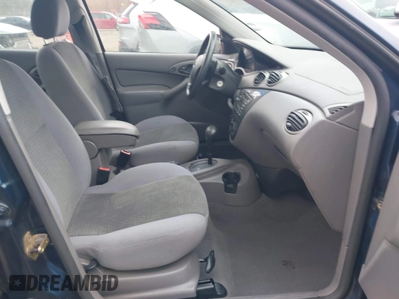 2004 Ford Focus SE with VIN 1FAFP34Z04W169203, listed as a IAAI auction lot 41715587 with 195,833 mi miles and . Bid and sale history available at DreamBid. Image 5.