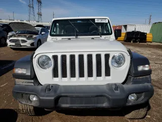 2019 Jeep Wrangler Unlimited Sport Altitude with VIN 1C4HJXDG9KW556159, listed as a Copart auction lot 49736915 with 77,374 mi miles and Salvage title. Bid and sale history available at DreamBid. Image 5.