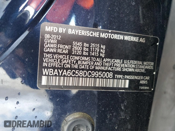 2013 BMW 7 Series 740i with VIN WBAYA6C58DC995008, listed as a Copart auction lot 62008795 with 95,974 mi miles and Salvage title. Bid and sale history available at DreamBid. Image 12.