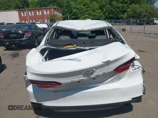 2023 Toyota Camry LE z VIN 4T1C11AK0PU145781, wystawiony jako IAAI lot #42404456 z przebiegiem 53 657 mil mil oraz . Historia ofert i sprzedaży dostępna na DreamBid. Obrazek 16.