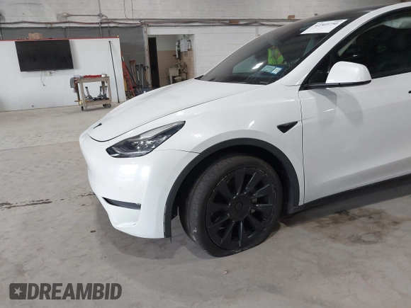 2020 Tesla Model Y Long Range z VIN 5YJYGDEE5LF041935, wystawiony jako IAAI lot #42369750 z przebiegiem 79 540 mil mil oraz . Historia ofert i sprzedaży dostępna na DreamBid. Obrazek 21.