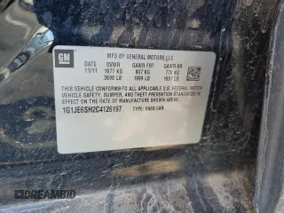 2012 Chevrolet Sonic LTZ z VIN 1G1JE6SH2C4126197, wystawiony jako Copart lot #85541214 z przebiegiem Nie podano mil oraz Szkoda całkowita • Salvage title. Historia ofert i sprzedaży dostępna na DreamBid. Obrazek 14.