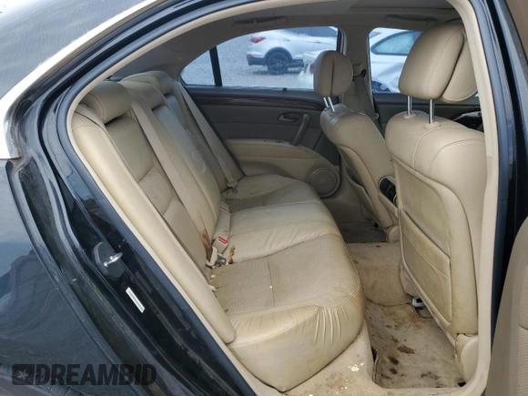 2006 Acura RL z VIN JH4KB16586C010597, wystawiony jako Copart lot #53846535 z przebiegiem 212 219 mil mil oraz Szkoda całkowita • Salvage title. Historia ofert i sprzedaży dostępna na DreamBid. Obrazek 10.