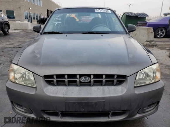 2002 Hyundai Accent GL with VIN KMHCG45C72U269610, listed as a Copart auction lot 80362953 with 89,481 mi miles and Salvage Title. Bid and sale history available at carsss.com. Image 5.
