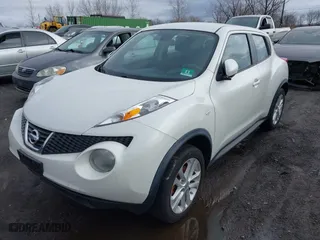 2013 Nissan Juke S with VIN JN8AF5MV7DT224719, listed as a IAAI auction lot 41725554 with 140,285 mi miles. Bid and sale history available at carsss.com. Image 2.
