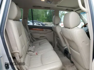 2003 Lexus GX 470 z VIN JTJBT20X230019515, wystawiony jako Copart lot #58790725 z przebiegiem 238 380 mil mil oraz Tytuł czysty. Historia ofert i sprzedaży dostępna na DreamBid. Obrazek 11.